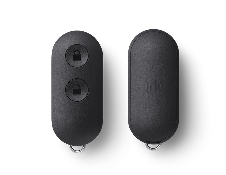 Qrio Lock専用のスマートキー「Qrio Key」の製品画像。鍵の開閉ボタンが付いた小型リモコン。